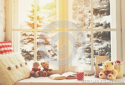 Christmas winter window with a book, a cup of hot tea Stock Photo