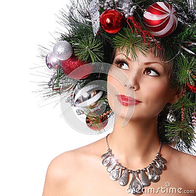 Christmas Woman. Fashion Girl with New Year Decorated Hairstyle. Stock Photo