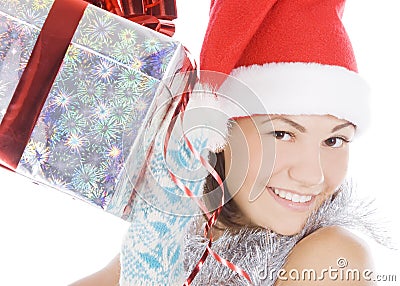 Christmas woman in santa hat holding gift Stock Photo