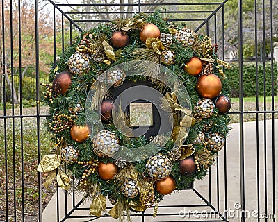 Christmas Wreath adorning an entrance gate outside a mansion in Dallas, Texas Stock Photo