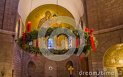 Christmas wreath decorates the interior of Abbey of the Dormition Basilica. Old city of Jerusalem Israel Editorial Stock Photo