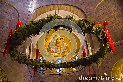 Christmas wreath decorates the interior of Abbey of the Dormition Basilica. Old city of Jerusalem Israel Editorial Stock Photo