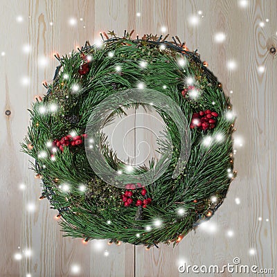 Christmas wreath of fir on a wooden background Stock Photo