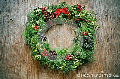 Christmas wreath on a rustic door Stock Photo