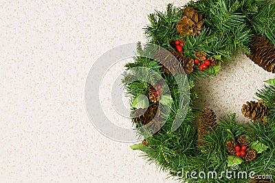 Christmas wreath on a white wall Stock Photo