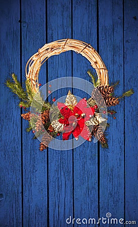 Christmas wreath on wooden door Stock Photo