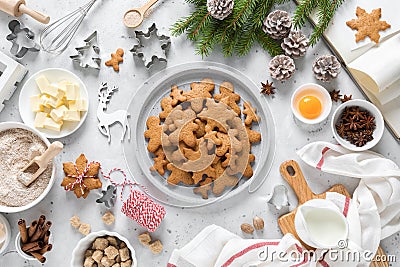 Christmas or X-mas baking culinary background, cooking recipe. Xmas, Noel gingerbread cookies on kitchen table and ingredients Stock Photo