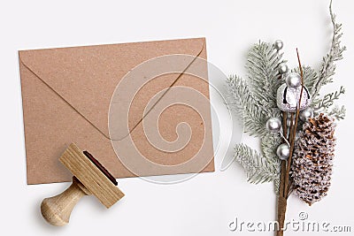 Christmas, Xmas rubber stamp and kraft envelope. Mockup for winter holiday products Stock Photo