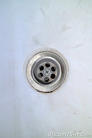 Chrome colored sink drain hole Stock Photo