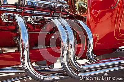 Chrome exhaust system on hot rod Stock Photo