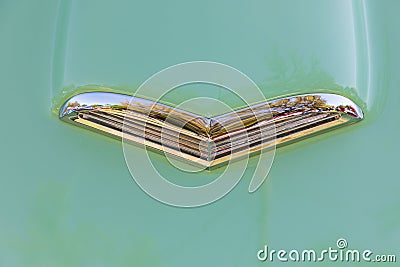 Chrome hood vent on a vintage Ford Thunderbird in sea foam green Editorial Stock Photo