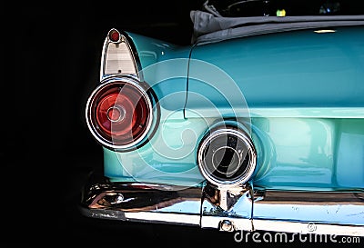 Chrome rear tail lights, bumber and exhaust of convertable aqua Stock Photo