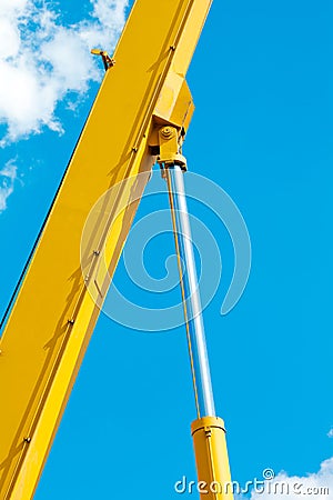 The chromeplated piston of a crane truck Stock Photo