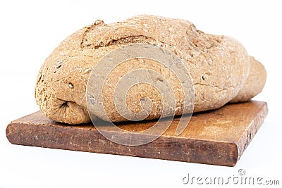 Chrono Bread With Cereals On The Wooden Cutting Board Stock Photo