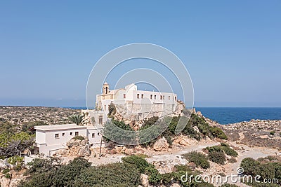 Chrysoskalitissa Monastery built up on rock, Chania town Creete island, Greeece. Aerial drone view Stock Photo