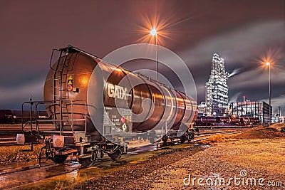 Chunting yard with petrochemical production plant on the background. Editorial Stock Photo