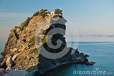 The church of Agios Ioannis Kastri on a rock at sunset, famous from Mamma Mia movie scenes, Skopelos Island Stock Photo