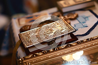 Church attribute a golden Bible with a lock on the altar, gospel, holy Stock Photo