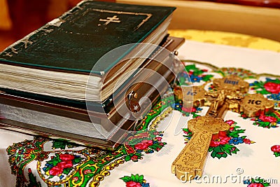 Bible, old church books. Cross put near the books Stock Photo