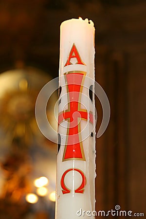 Church candle burning Stock Photo