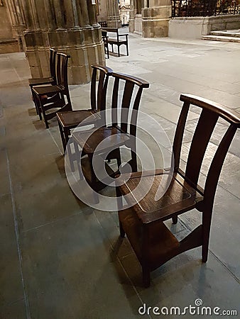 Church chairs in wood Stock Photo