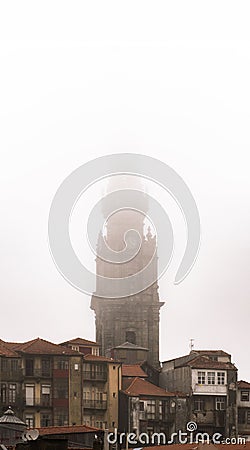 Church of the Clerics, baroque from the 17th century, standing out among the houses and roofs of the historic neighborhood of Stock Photo