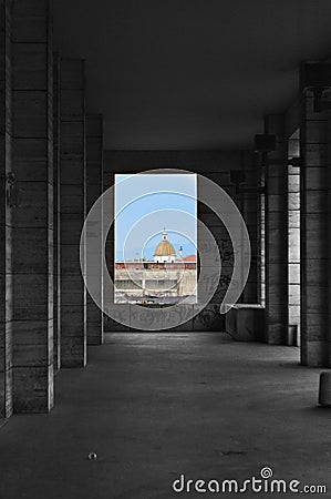 Church dome framed by a black and white colonnade Stock Photo