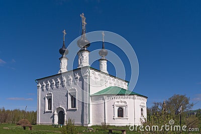 Church of the Entry into Jerusalem 1707 with black domes and crosses shining in the spring sun. Suzdal, Golden Ring of Russia Editorial Stock Photo