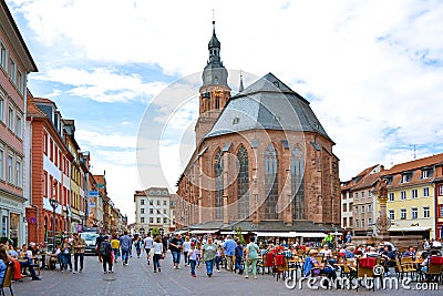 Church of the Holy Spirit called `Heiliggeistkirche` in German at marketplace in historical city center on sunny day Editorial Stock Photo