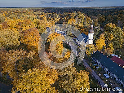 Church in Kliczkow and fall colors Stock Photo