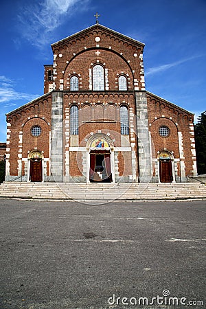 Church in the legnano brick tower sidewalk italy lombardy Stock Photo