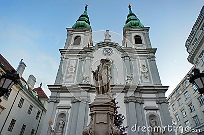 Catholic Church of Mariahilf with statue of Franz Joseph Haydn - landmark attraction in Vienna, Austria Stock Photo