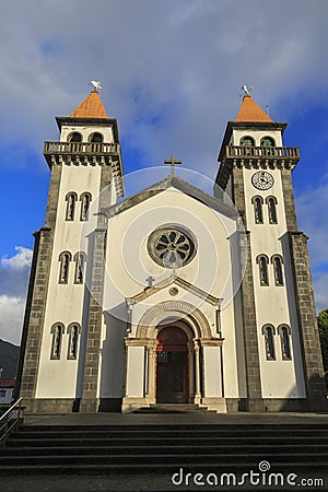 Church of Nossa Senhora da Alegria in Furnas with cloudy blue sky Stock Photo