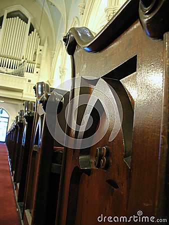 Church organ and pew Stock Photo