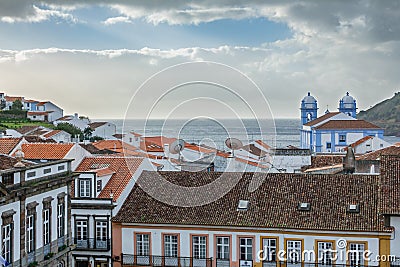 Church, roofs and ocean in Angra do Heroismo, Island of Terceira, Azores Stock Photo