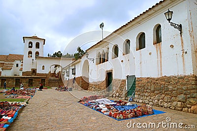 The Church`s Bell Tower and the Plaza at Chinchero Village Hilltop, Located in the Sacred Valley of the Inca, Cuzco region, Peru Stock Photo