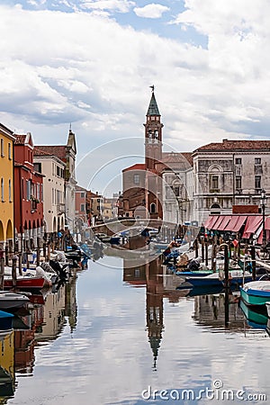 Chioggia - Church of Saint James Apostle with view of canal Vena nestled in charming town of Chioggia Stock Photo