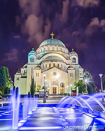Church of Saint Sava at night with colourful fountains Stock Photo