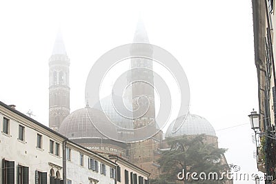 Church of St. Antonio in the city of Padova, Italy. Heavy fog in the city of Padova. Padua. Side view of the Basilica of St Stock Photo