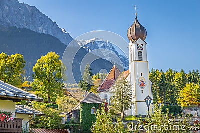 Church St Johannes, Wetterstein, Waxenstein and Zugspitze at sunrise, Grainau Stock Photo