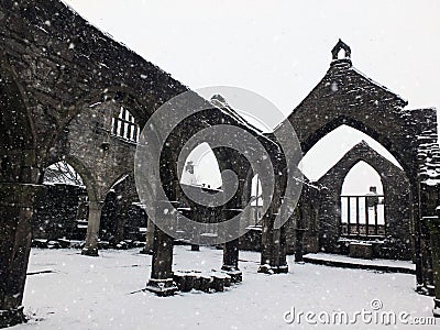 Church of st thomas a becket in heptonstall in falling snow Stock Photo