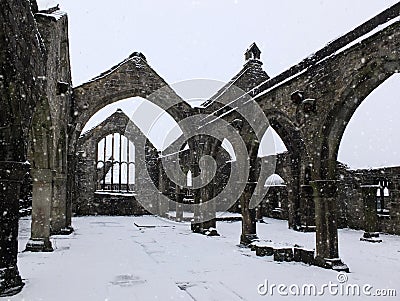 Church of st thomas a becket in heptonstall in falling snow Stock Photo