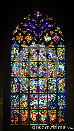 Church stained glass. Josselin, beautiful village of French Brittany Stock Photo