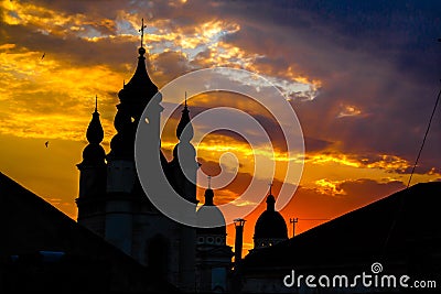 Church in a sunset beams in Lviv, Ukraine. Sunshine church contour Stock Photo