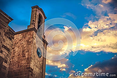 Church sunset light bell tower sky background south italy villa Stock Photo