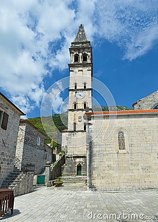 Church and tower with the clock Stock Photo