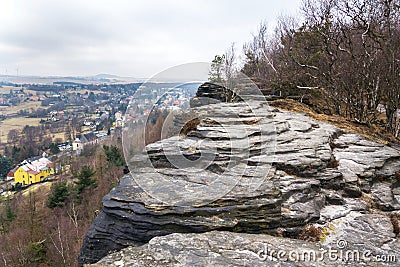 Church under Tisa rocks or Tisa walls in western Bohemian Switzerland, part of the Elbe Sandstone Rocks Stock Photo