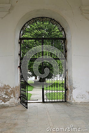 Churchyard gate to the park Stock Photo