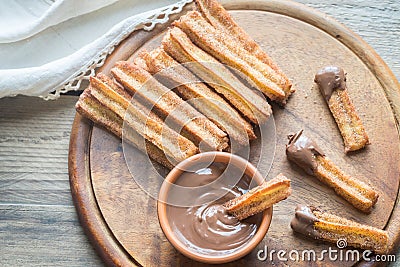 Churros - famous Spanish dessert with chocolate sauce Stock Photo