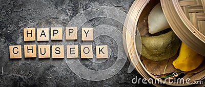 Chuseon day concept, korean thanksgiving day - songpyeon rice cakes on rustic background Stock Photo